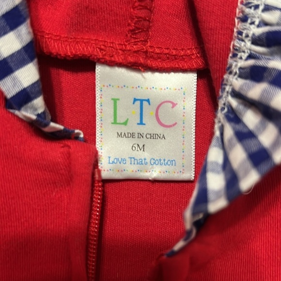 Red Hooded Jacket with Checkered Trim - Picture 2 of 5